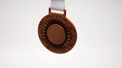 Fotografía real de Medallas Lux, acabado bronce · Vista 6